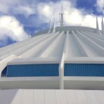 Space Mountain with clouds in the sky.